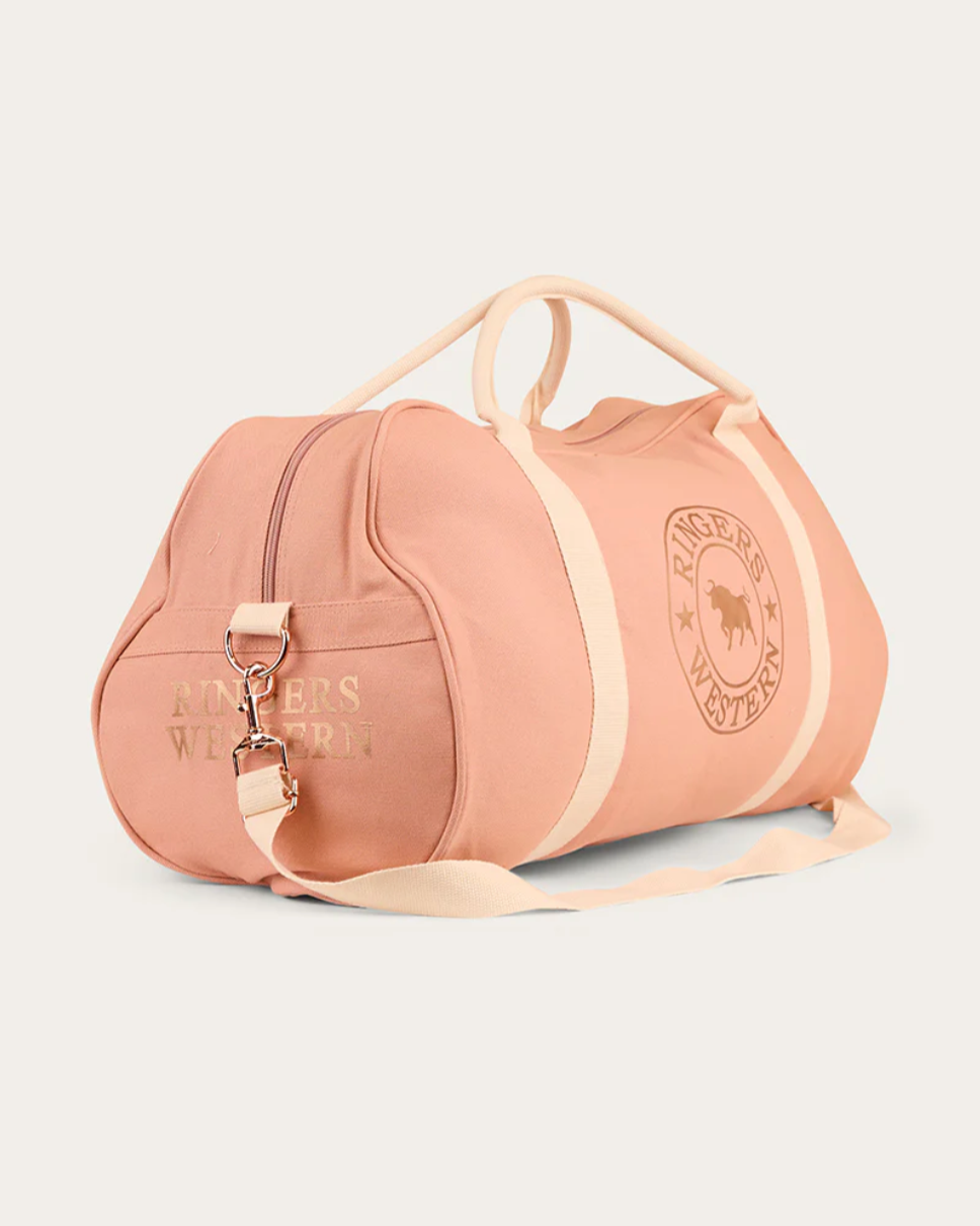 Pink duffel bag with a brand logo on a light gray background