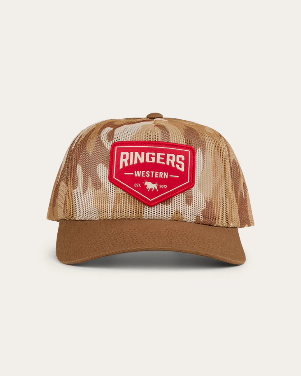 Camouflage baseball cap with a red 'Ringers Western' logo on a beige background