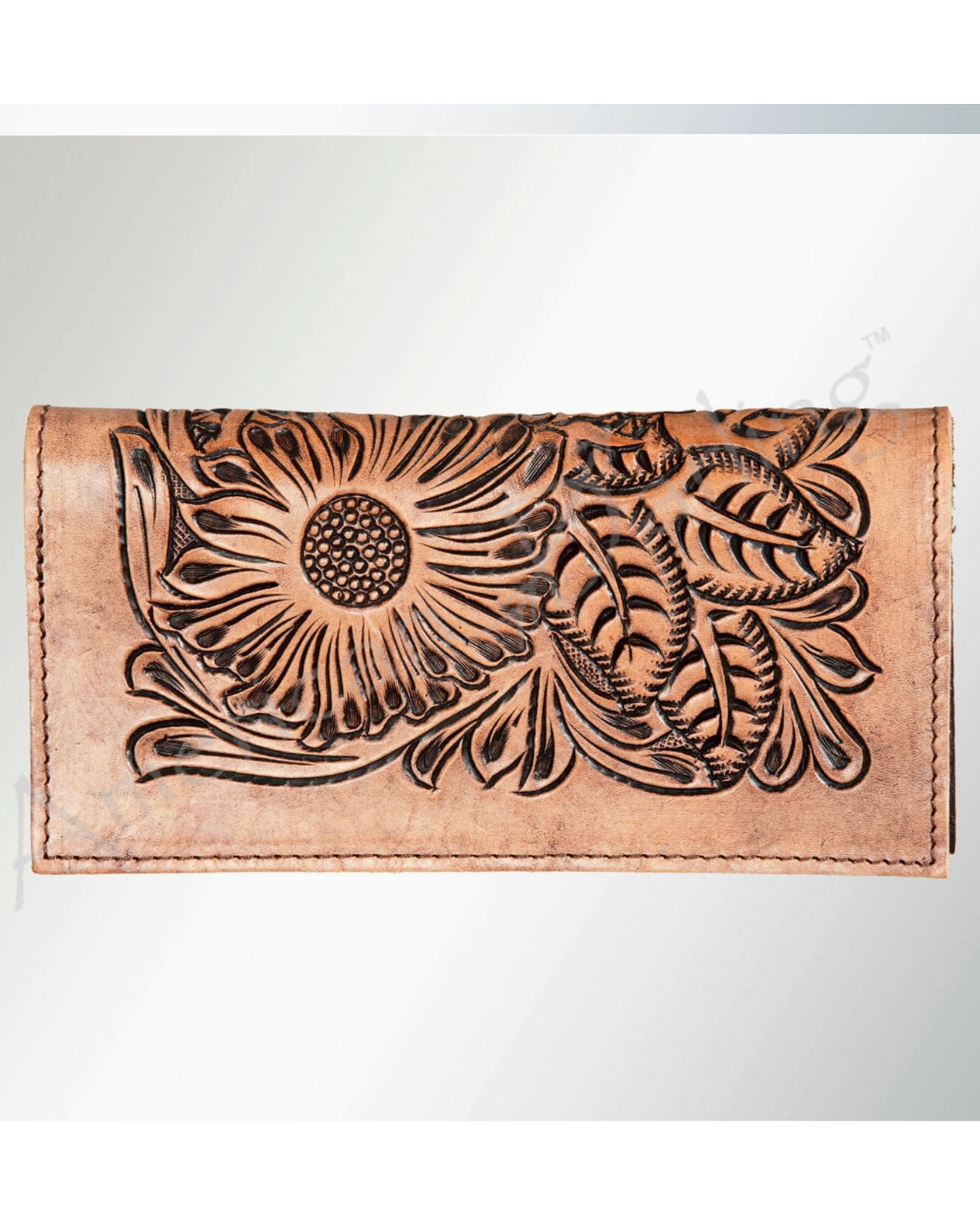 Brown leather wallet with intricate floral embossing on a white background