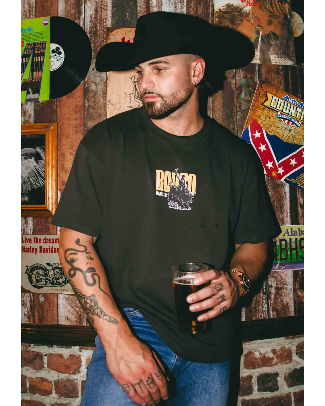 Ringers Western: Mens 100% Cotton Tee Shirt in Black with a "Rodeo Graphic" on the front - Texas Western New Zealand