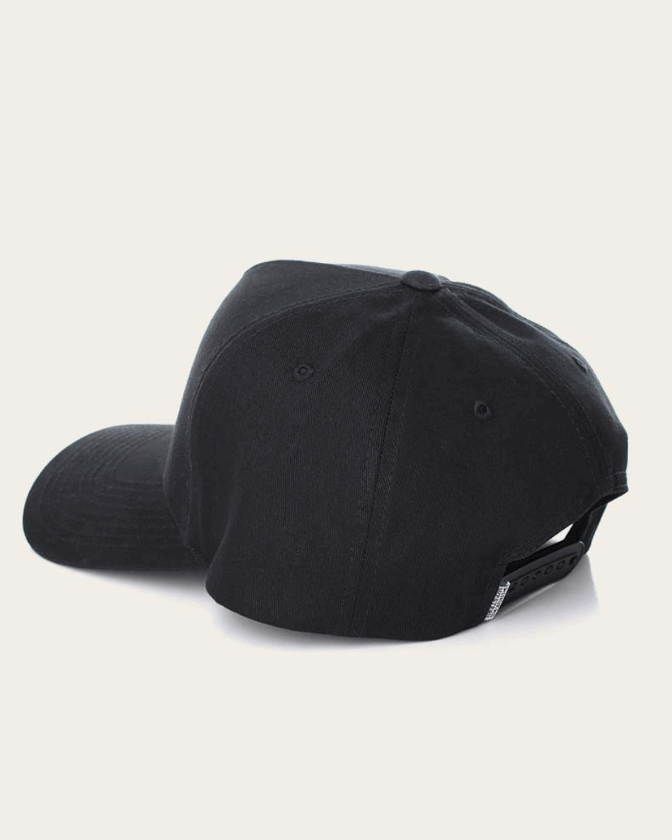 A black snapback cap featuring a structured six-panel design with a curved brim. The front panel showcases a circular embroidered patch with 'Ringers Western' text and a bull silhouette in white. The back of the cap includes an adjustable snap closure.