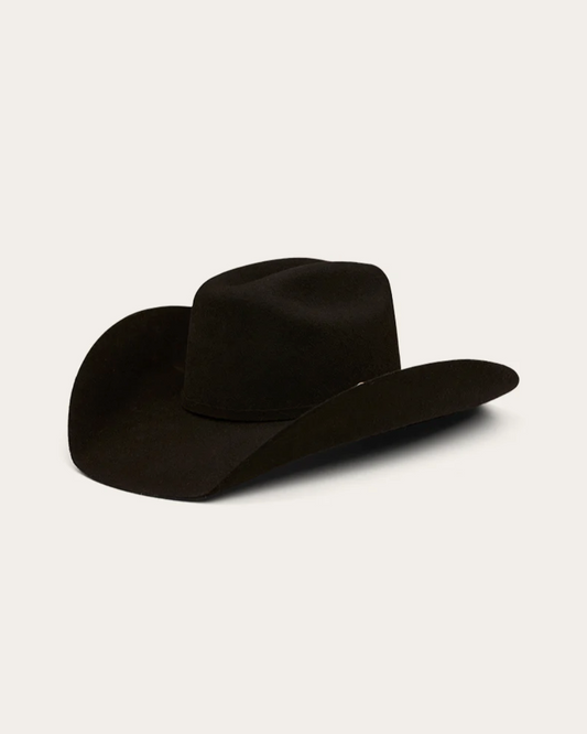 A classic black cowboy hat by Ringers Western, made of premium felt with a structured crown and a wide, upturned brim. A silver buckle accent on the hatband adds a refined touch.