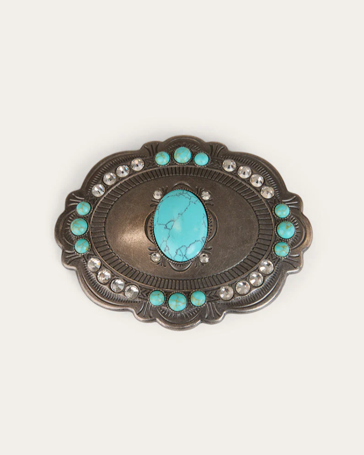 Decorative belt buckle with turquoise stones on a white background