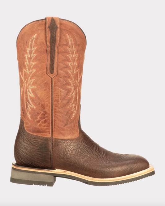 Brown leather cowboy boot with intricate design on a white background