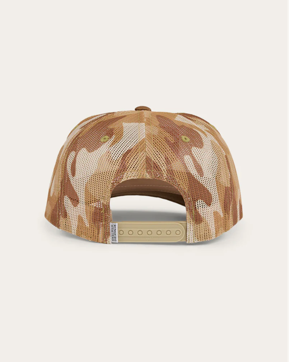 Camouflage-patterned cap on a beige background