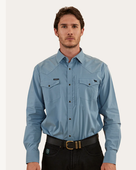 Man wearing a light blue shirt with a logo on a white background