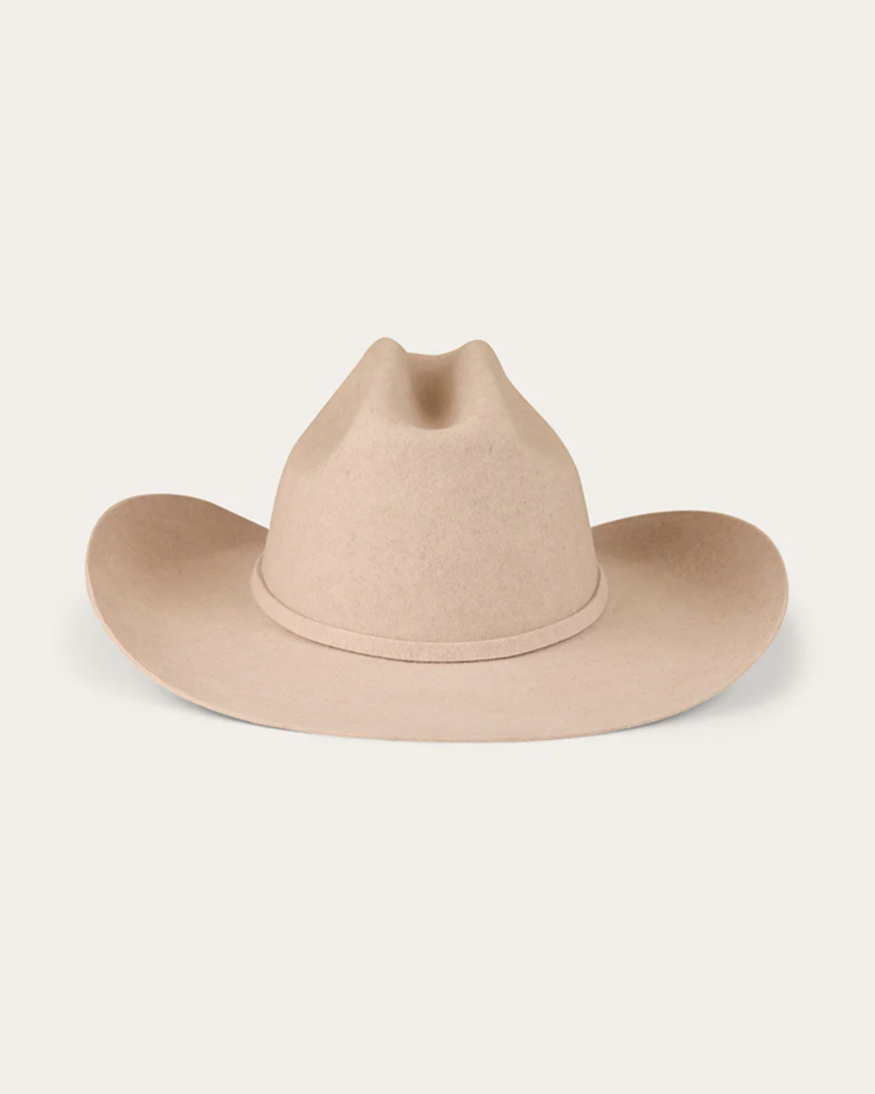 Beige cowboy hat on a white background