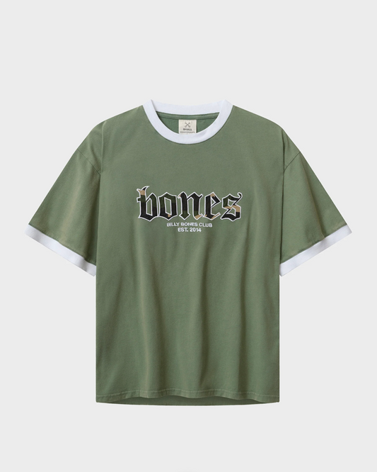 Green t-shirt with white trim and 'bones' logo on a light gray background