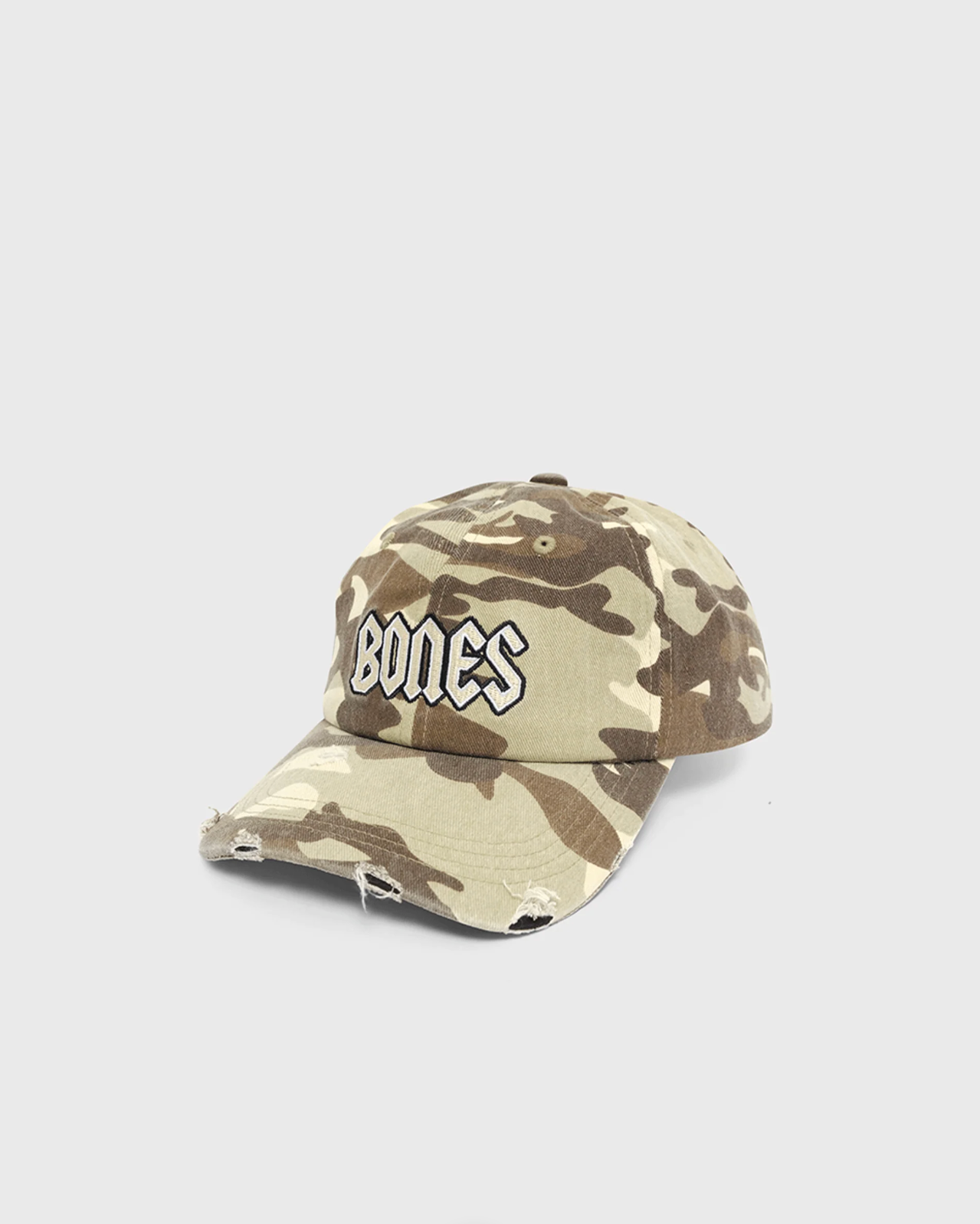 Camouflage baseball cap with 'Bones' logo on a white background