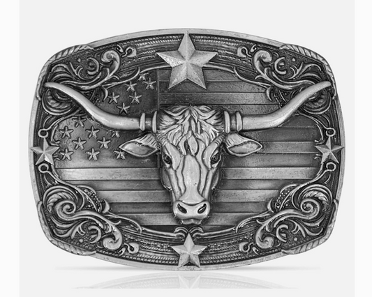 Belt buckle with bull head design and American flag pattern on a white background