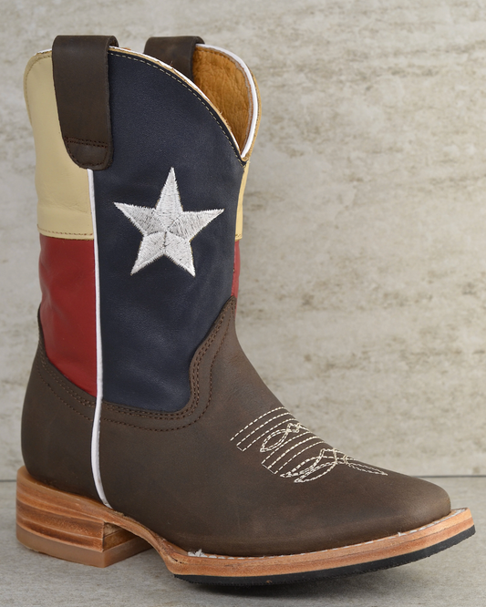 Cowboy boot with Texas flag design on a textured surface