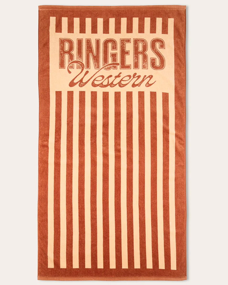 Towel with 'Ringers Western' text on a striped background