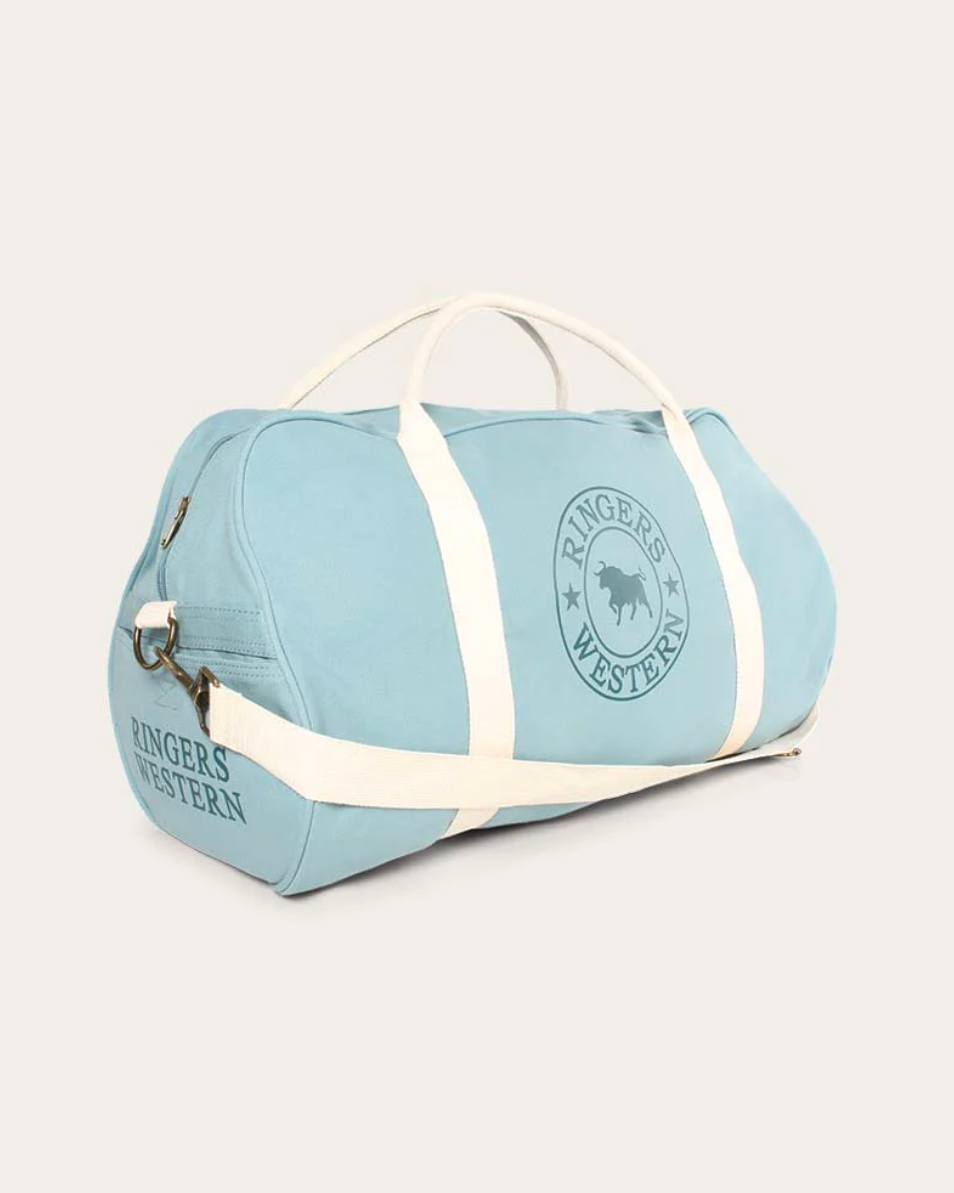 Light blue duffel bag with white straps on a light gray background