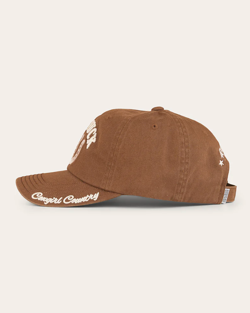 Brown cap with white text on a white background