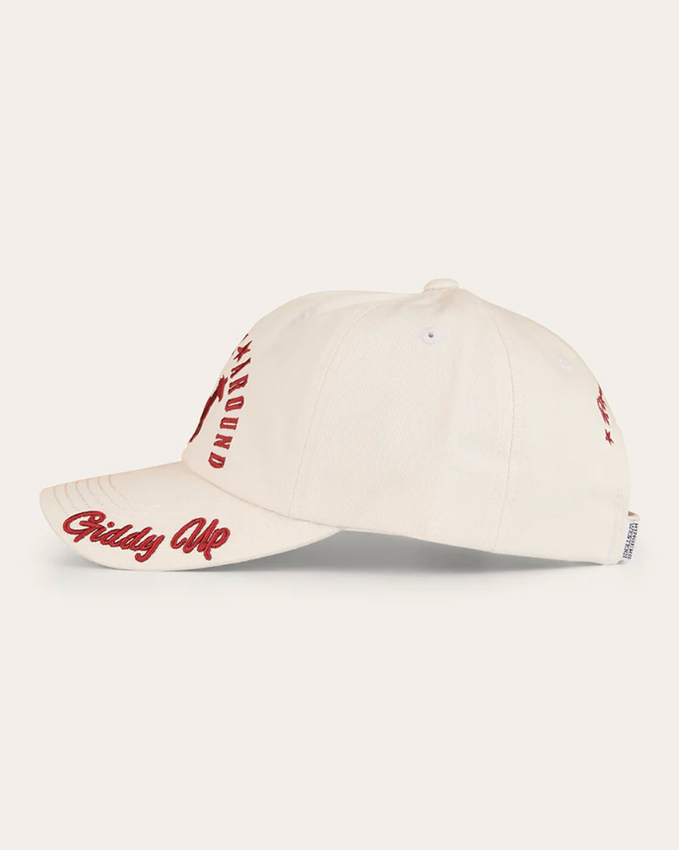 Beige cap with red text on a white background