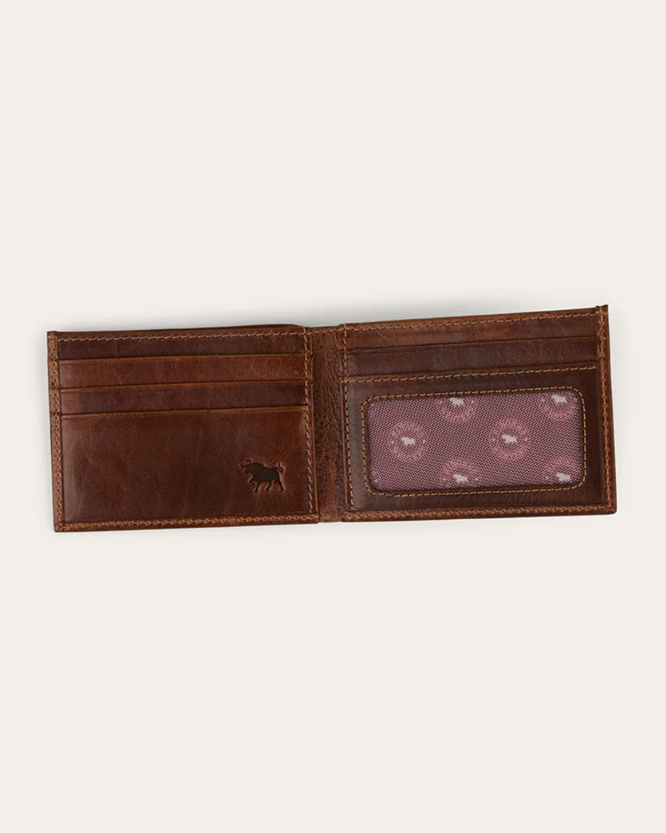 Brown leather wallet with a patterned interior on a white background