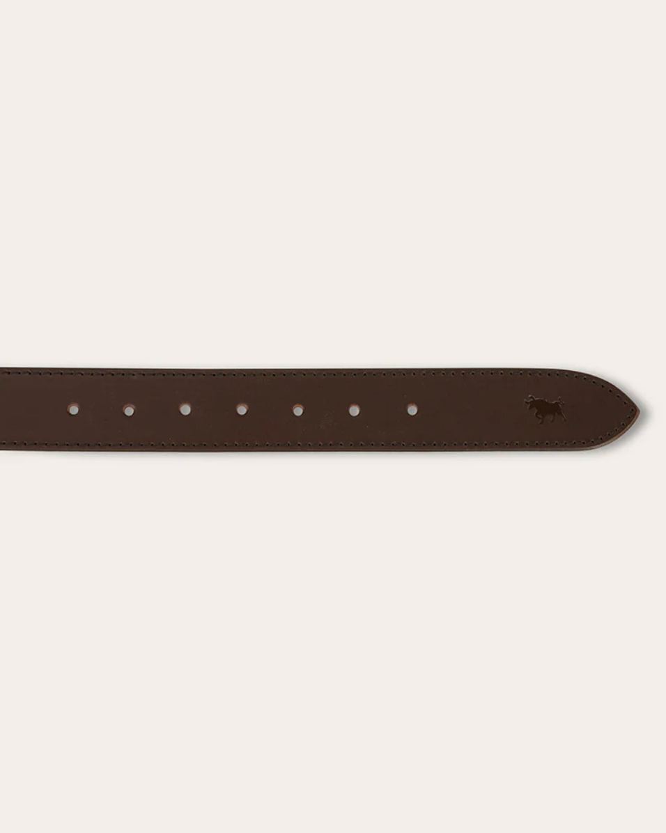 Brown leather belt on a light beige background