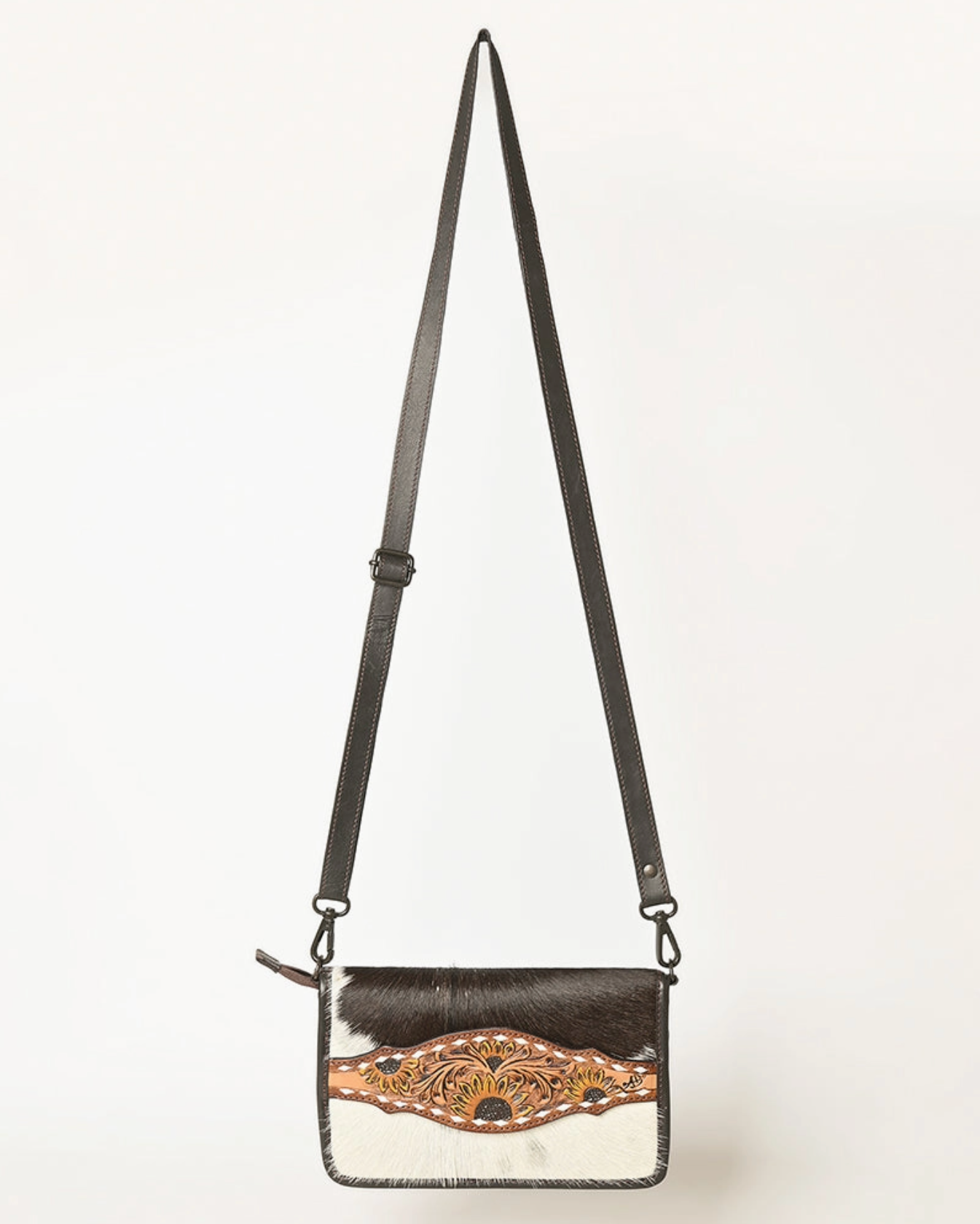 Handbag with decorative strap and pattern on a white background