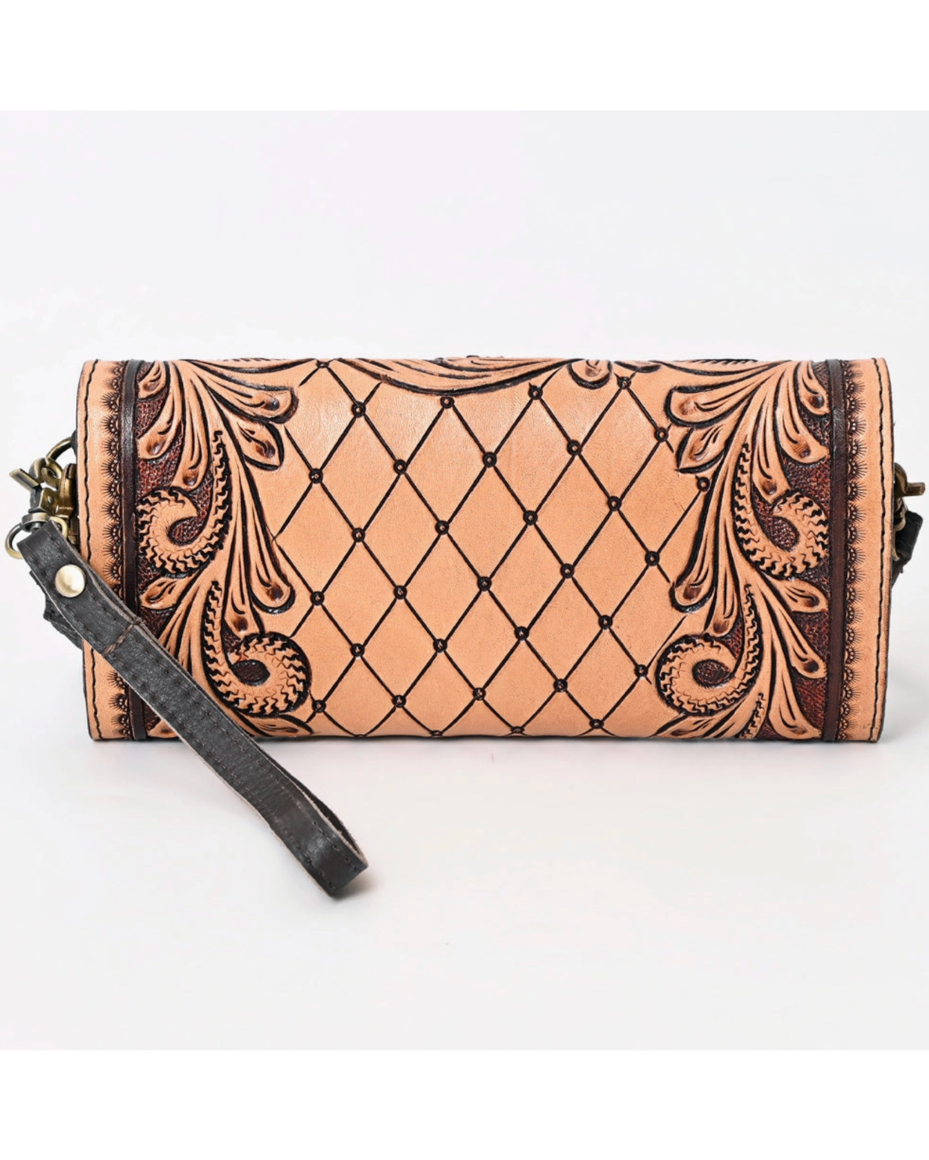 Leather clutch with intricate patterns on a white background