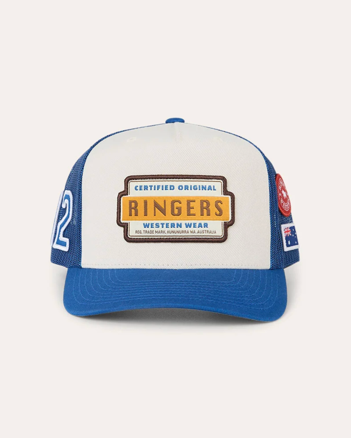 Ringers Western: Deep Fit Trucker Cap in Cream and Blue with an embroidered western patch on the front of the cap - Texas Western Apparel New Zealand