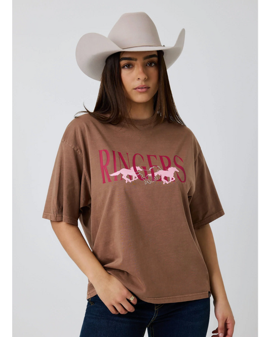 Ringers Western: Woman's 100% Cotton Brown Oversized Tee with a "Running Herd" Graphic on the front in pink - Texas Western New Zealand