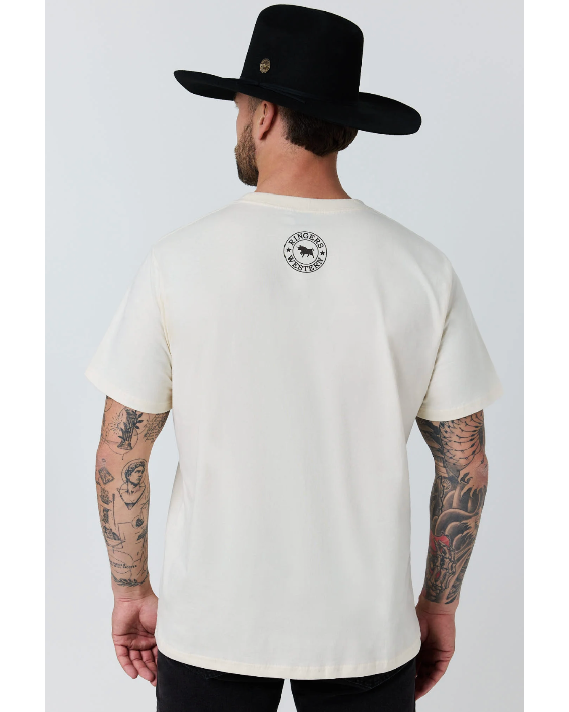 Ringers Western: Mens White 100% Cotton Tee Shirt featuring a graphic of a bull rider in black on the front - Texas Western New Zealand