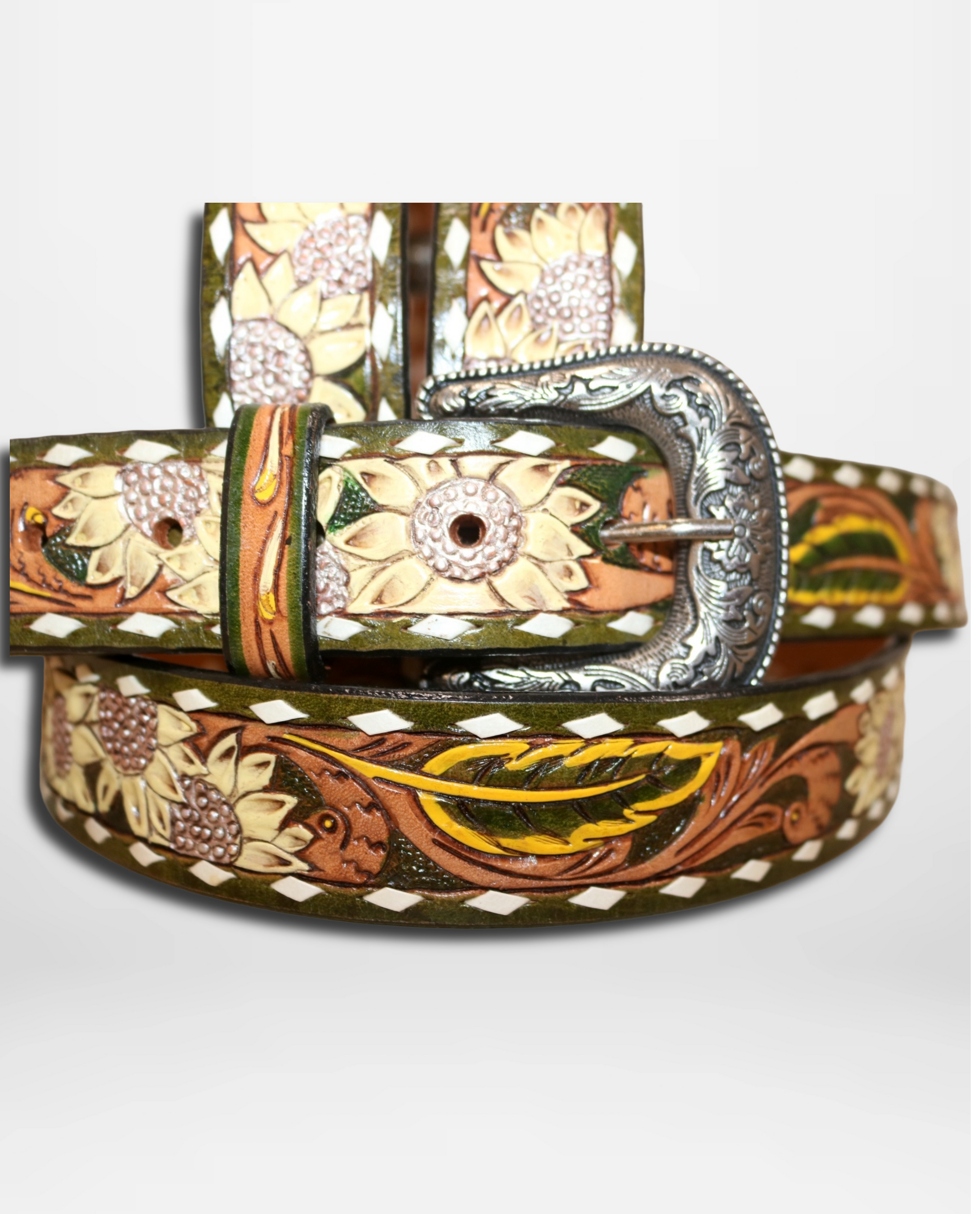 Decorative belt with floral patterns and a large silver buckle on a white background